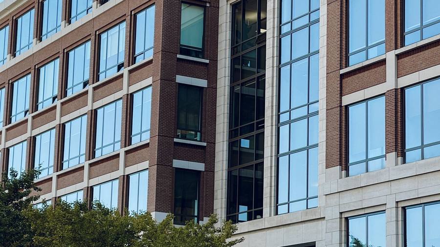 A modern brick and glass office building exterior